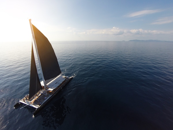 Amazing view to Yacht sailing in open sea at windy day. Drone view - birds eye angle. - Boost up color Processing.